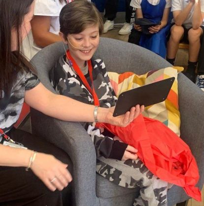 Pictured above: Alfie with Sarah McGee, Assistant Headteacher and SENDCo at Adswood Primary, Stockport