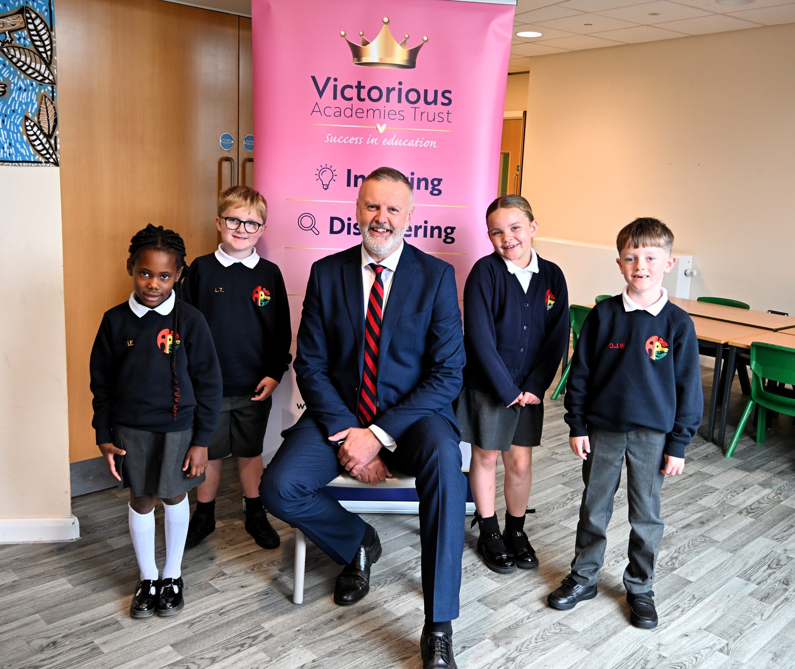 Aldwyn Primary Headteacher Craig Beaty with pupils.